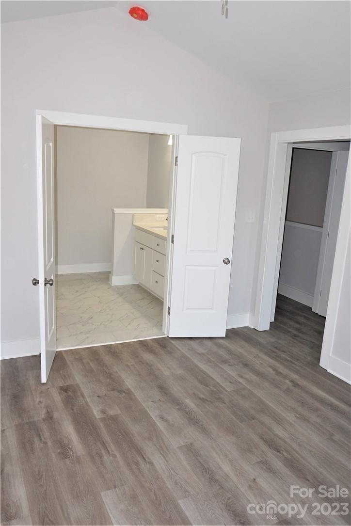 1048 McLain Road Kannapolis, NC 28083 - Photo 18 of 31 a view of empty room with wooden floor