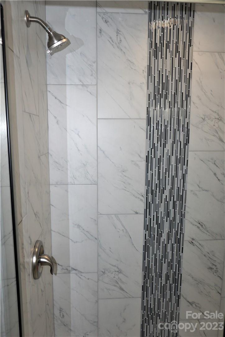 1048 McLain Road Kannapolis, NC 28083 - Photo 22 of 31 a bathroom with a shower