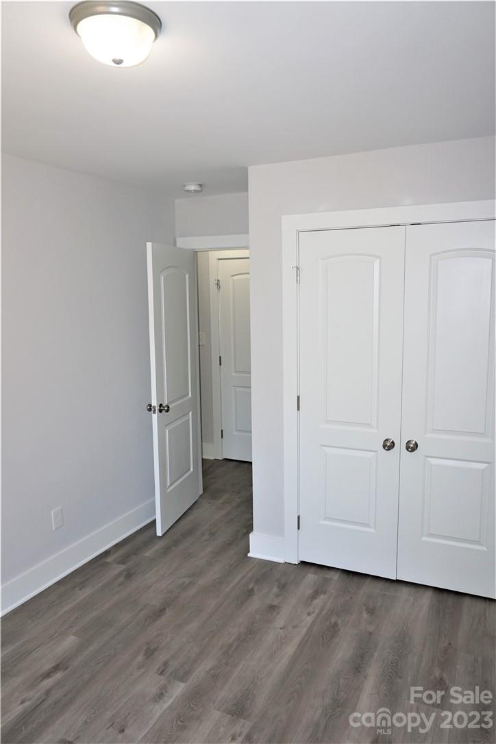 1048 McLain Road Kannapolis, NC 28083 - Photo 29 of 31 a view of an empty room and wooden floor