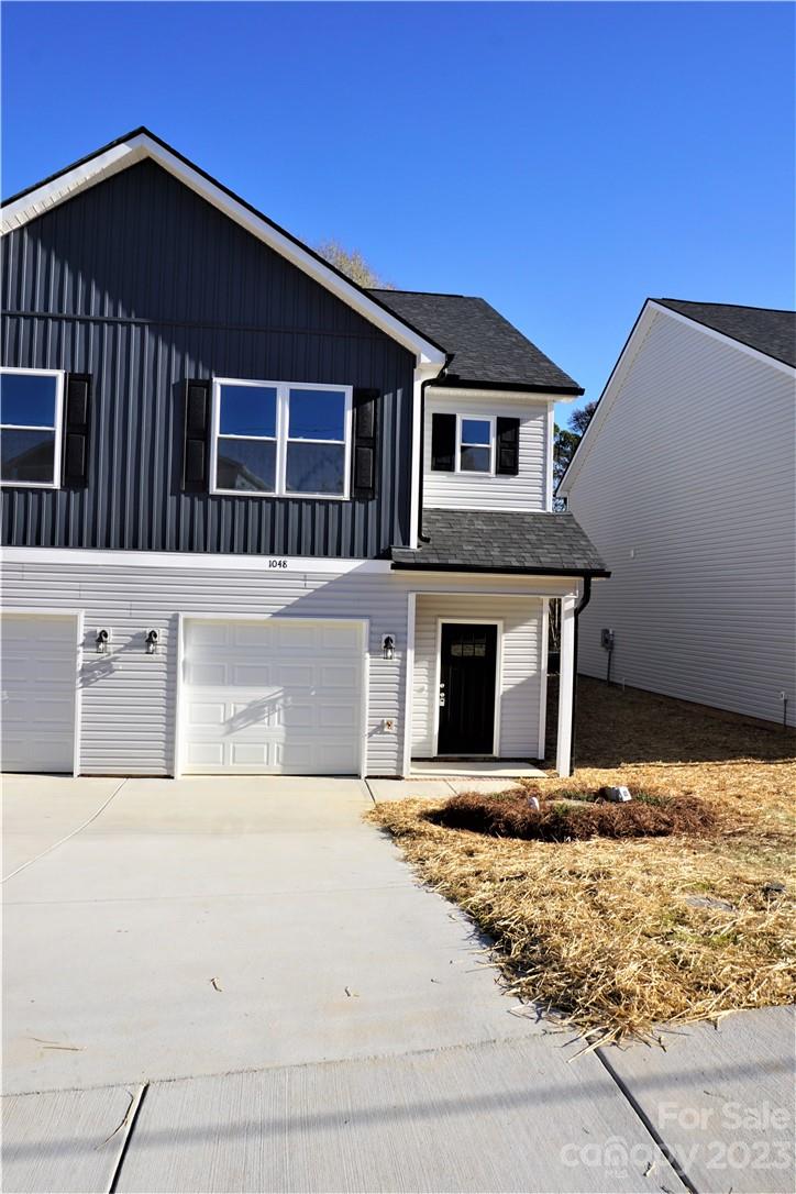 1048 McLain Road Kannapolis, NC 28083 - Photo 4 of 31 a front view of a house with yard