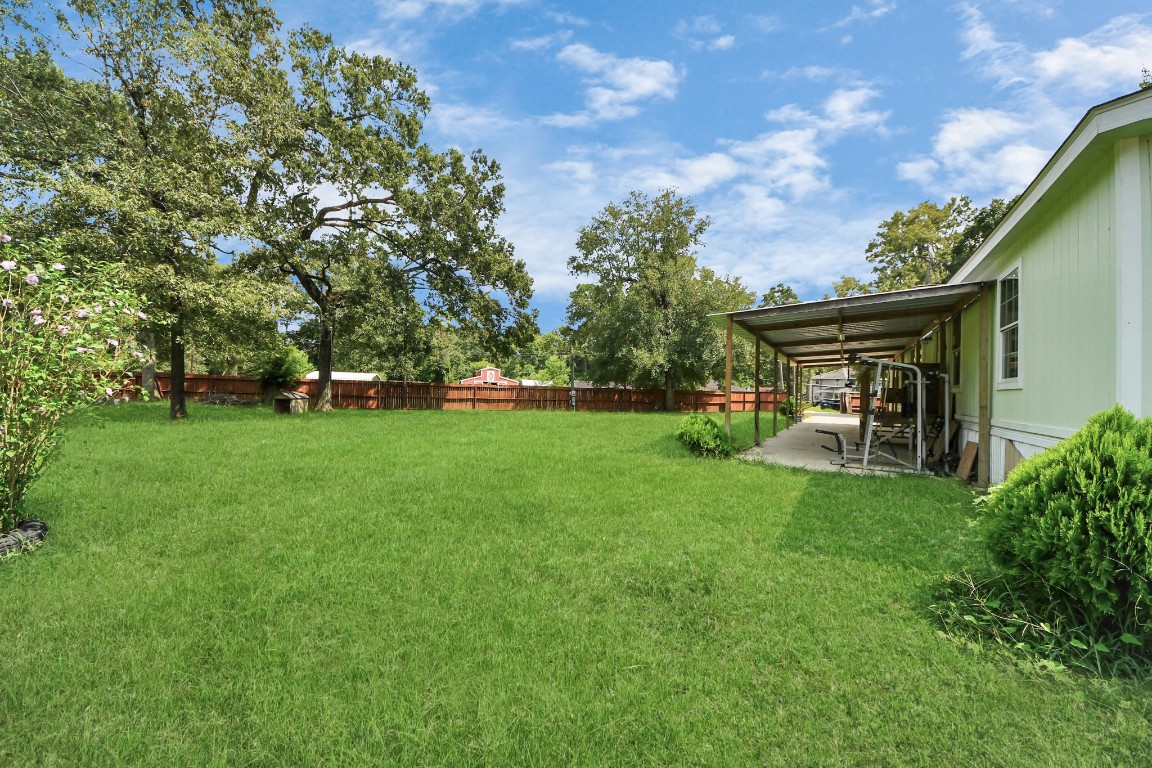 11844 Padok Road Houston, TX 77044 - Photo 11 of 41 a view of house with backyard