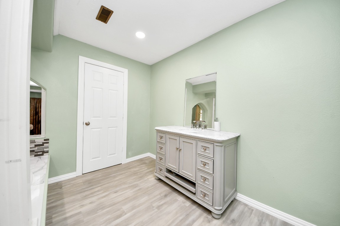 11844 Padok Road Houston, TX 77044 - Photo 28 of 41 a view of cabinets a sink and dishwasher in a room