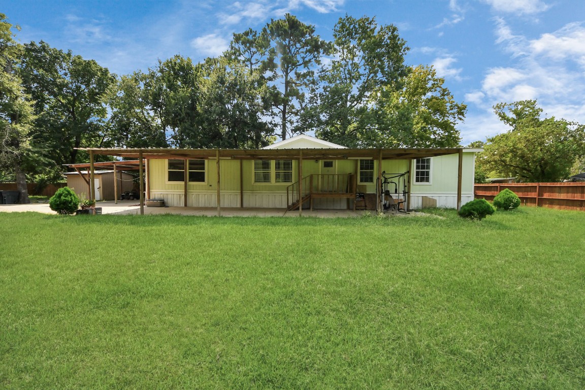 11844 Padok Road Houston, TX 77044 - Photo 8 of 41 a front view of house with yard and green space
