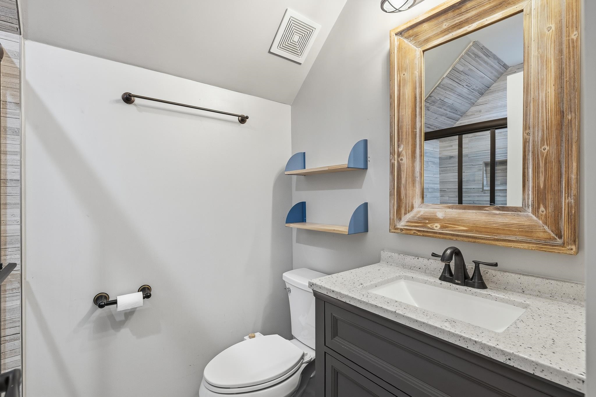 1234 Greenview Road Collierville, TN 38017 - Photo 24 of 33 a bathroom with a granite countertop sink vanity mirror and toilet