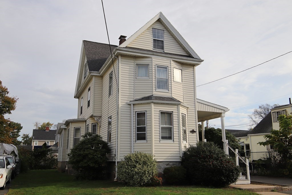 3 Linwood Street Saugus, MA 01906 - Photo 1 of 42 a front view of a house with a yard