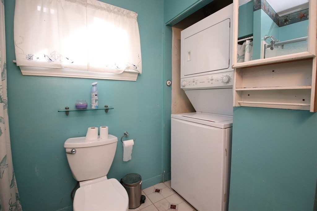 3 Linwood Street Saugus, MA 01906 - Photo 17 of 42 a bathroom with a toilet sink and mirror