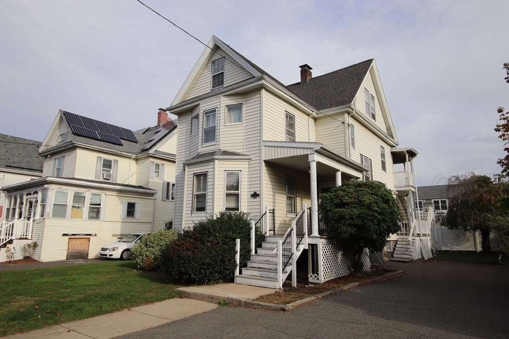 3 Linwood Street Saugus, MA 01906 - Photo 2 of 42 a front view of a house with a yard