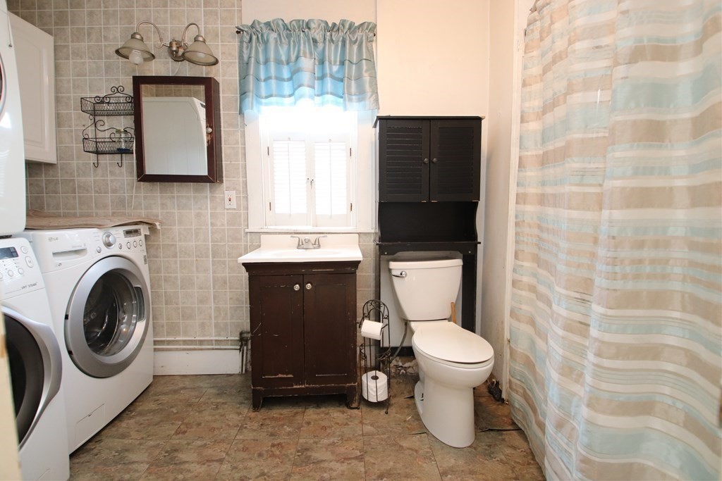 3 Linwood Street Saugus, MA 01906 - Photo 28 of 42 a bathroom with a toilet and a sink