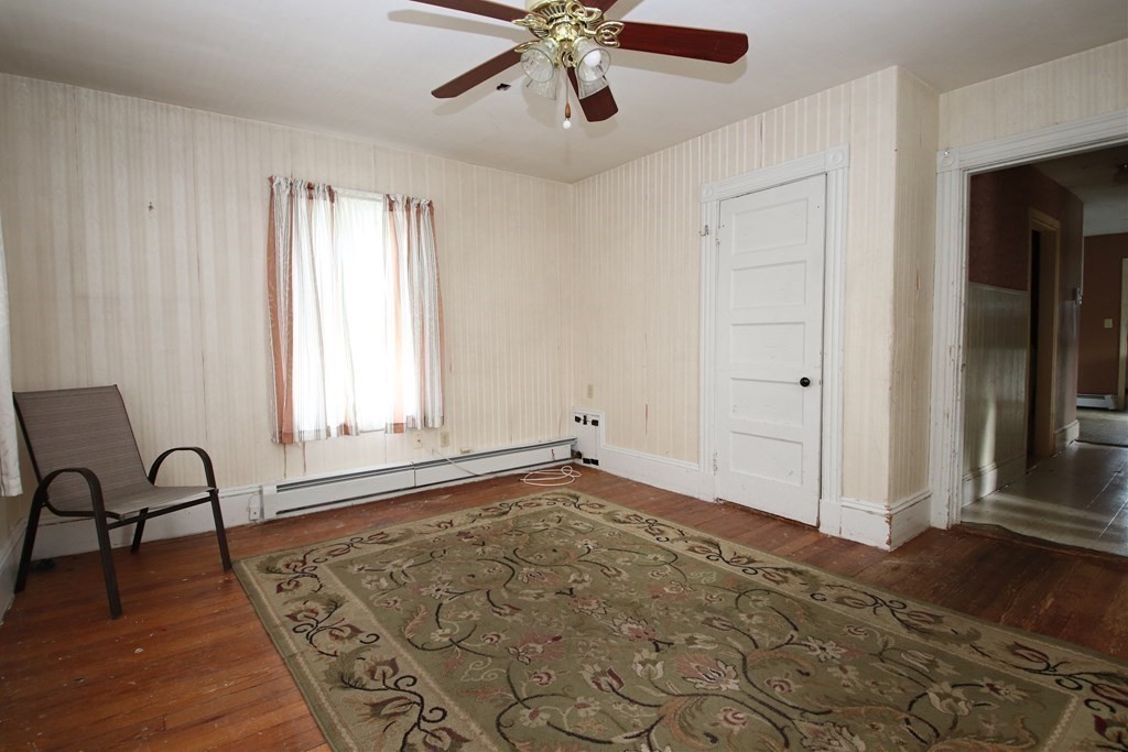3 Linwood Street Saugus, MA 01906 - Photo 33 of 42 a view of a livingroom with a window and wooden floor