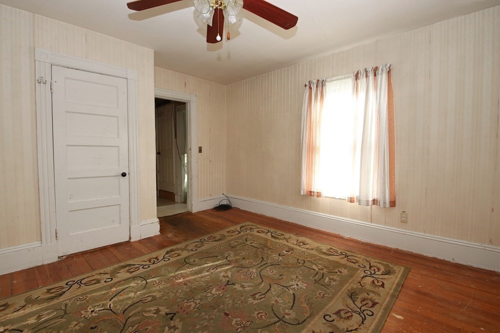 3 Linwood Street Saugus, MA 01906 - Photo 34 of 42 wooden floor in an empty room with a window