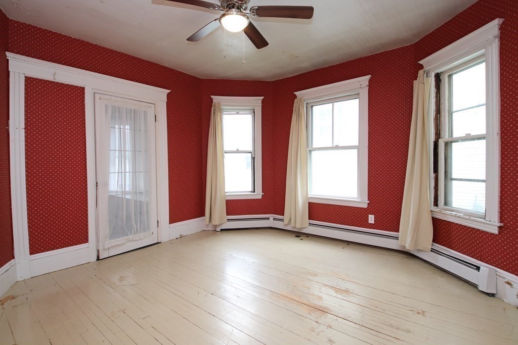3 Linwood Street Saugus, MA 01906 - Photo 8 of 42 a view of an empty room with glass door