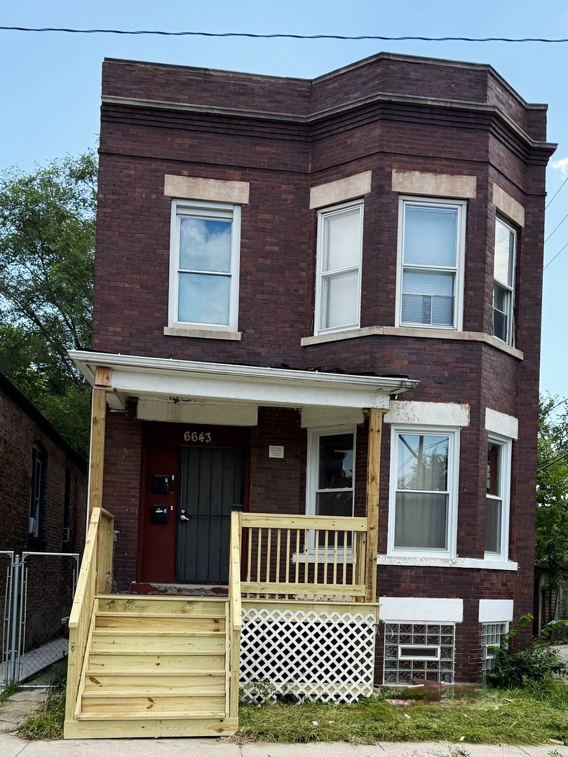 6643 South Laflin Street Chicago, IL 60636 - Photo 1 of 15 a front view of a house