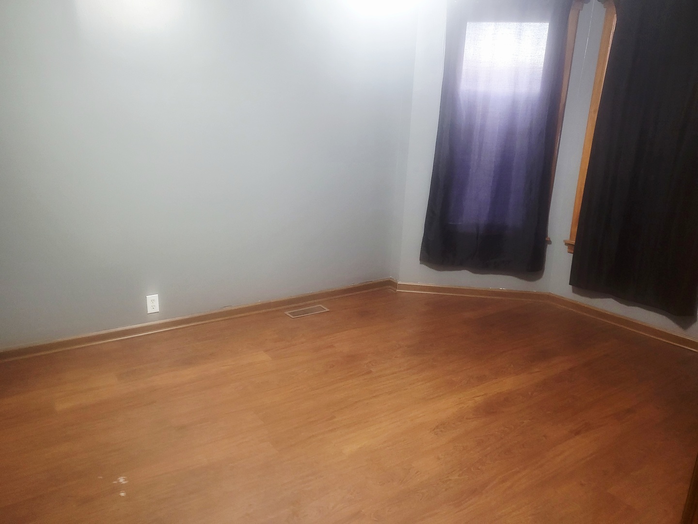 6643 South Laflin Street Chicago, IL 60636 - Photo 7 of 15 an empty room with wooden floor