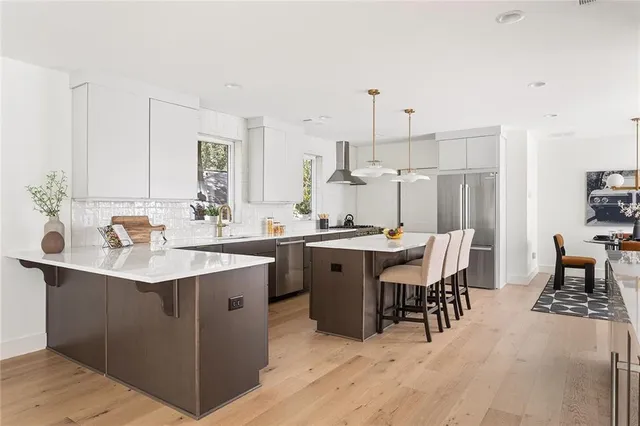 a kitchen with a sink and cabinets