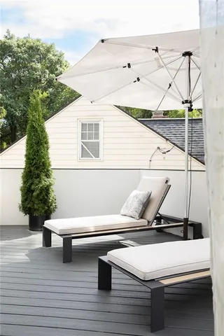 a bathroom with double sink and a mirror