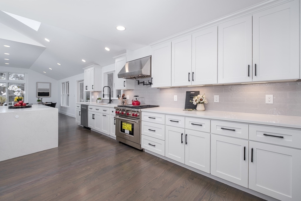 26 Harris Avenue Wellesley, MA 02481 - Photo 5 of 42 a kitchen with cabinets and window