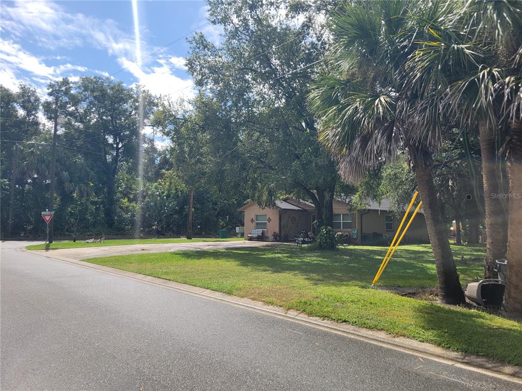 188 Mary Street Winter Garden, FL 34787 - Photo 13 of 35 a view of a swimming pool with a slide and a table