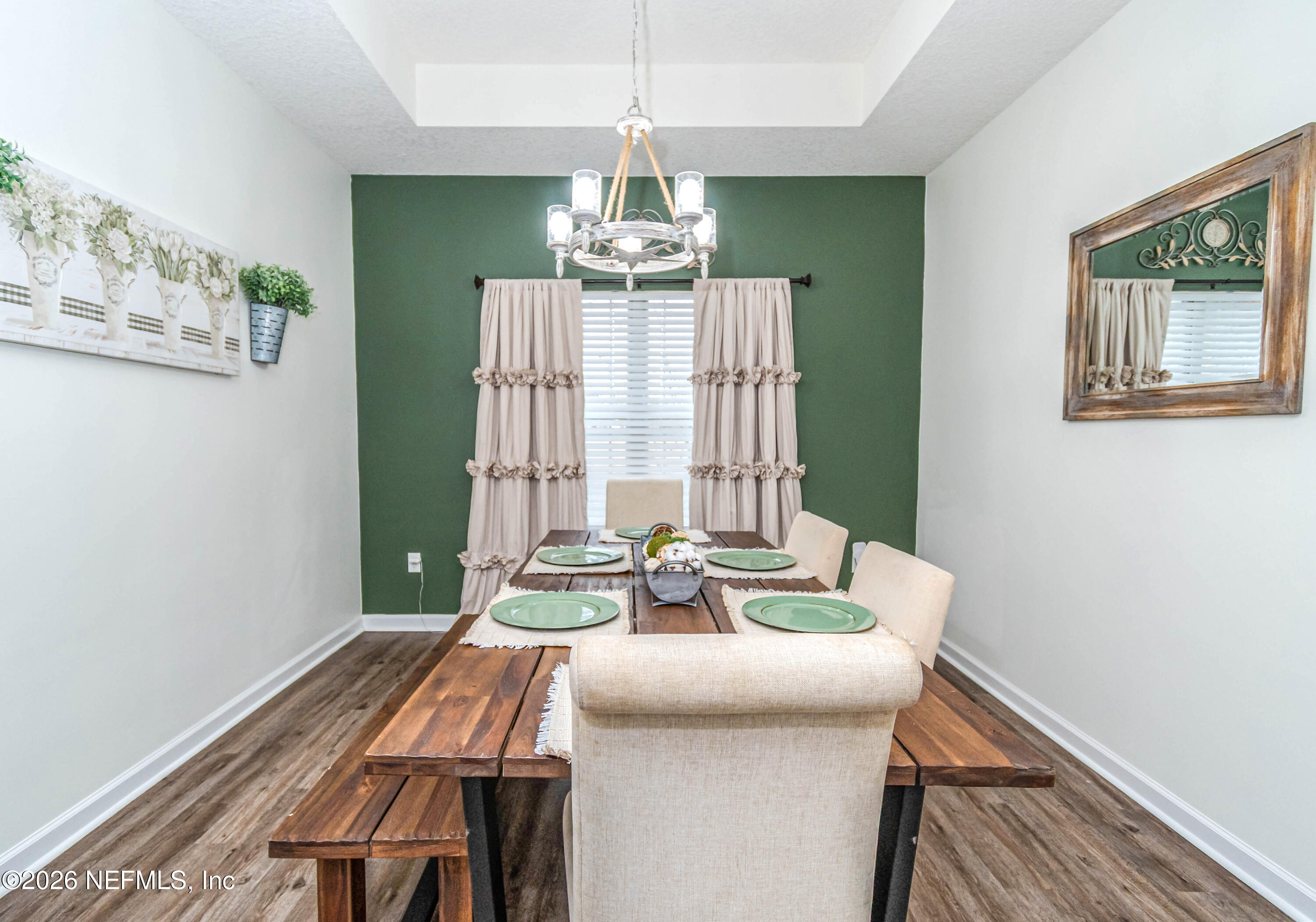 8139 Hunters Ridge South Glen St. Mary, FL 32040 - Photo 20 of 49 a dining room with furniture and window