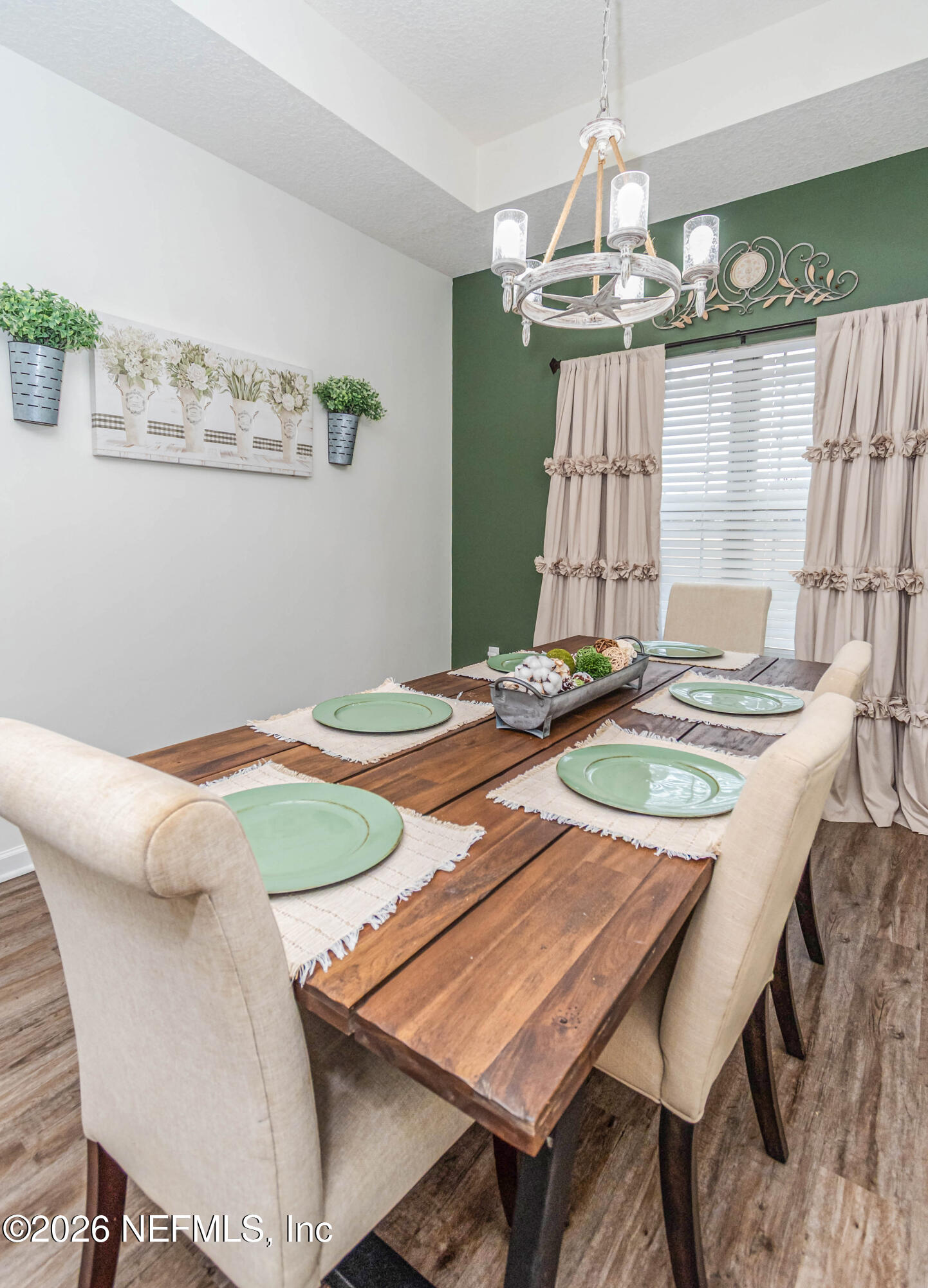 8139 Hunters Ridge South Glen St. Mary, FL 32040 - Photo 21 of 49 a view of a dining room with furniture