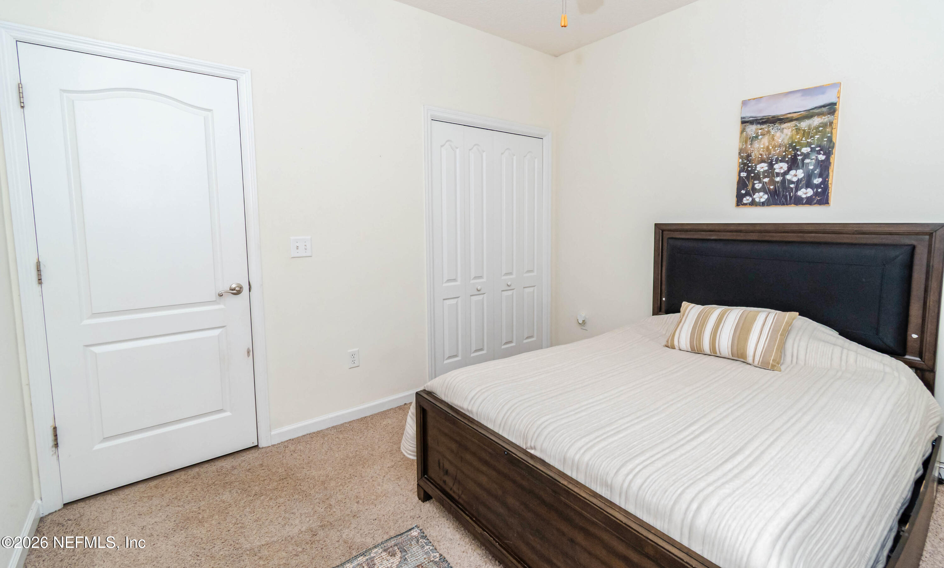 8139 Hunters Ridge South Glen St. Mary, FL 32040 - Photo 29 of 49 a bedroom with a bed and a window