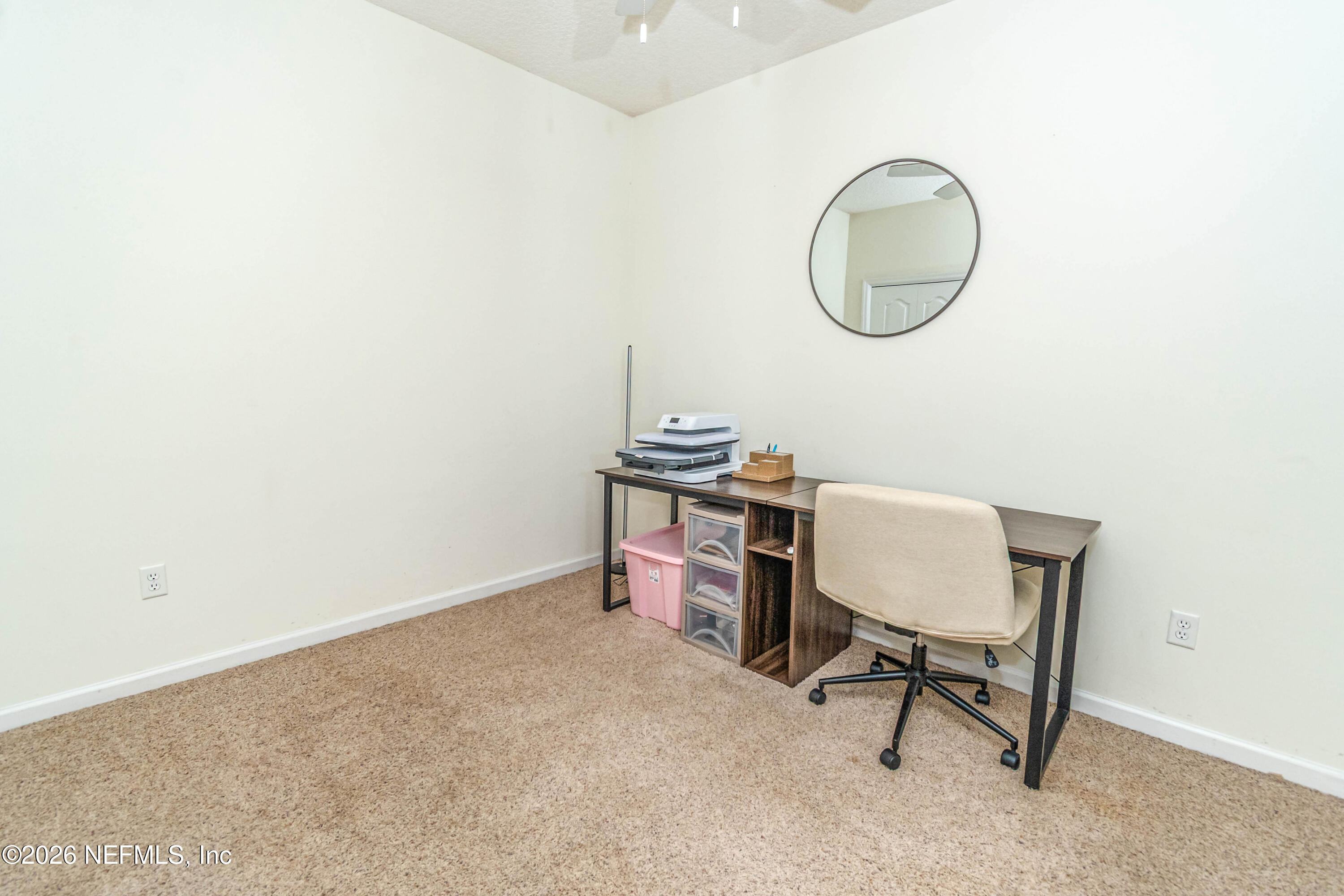 8139 Hunters Ridge South Glen St. Mary, FL 32040 - Photo 32 of 49 a view of a room with a table and chairs