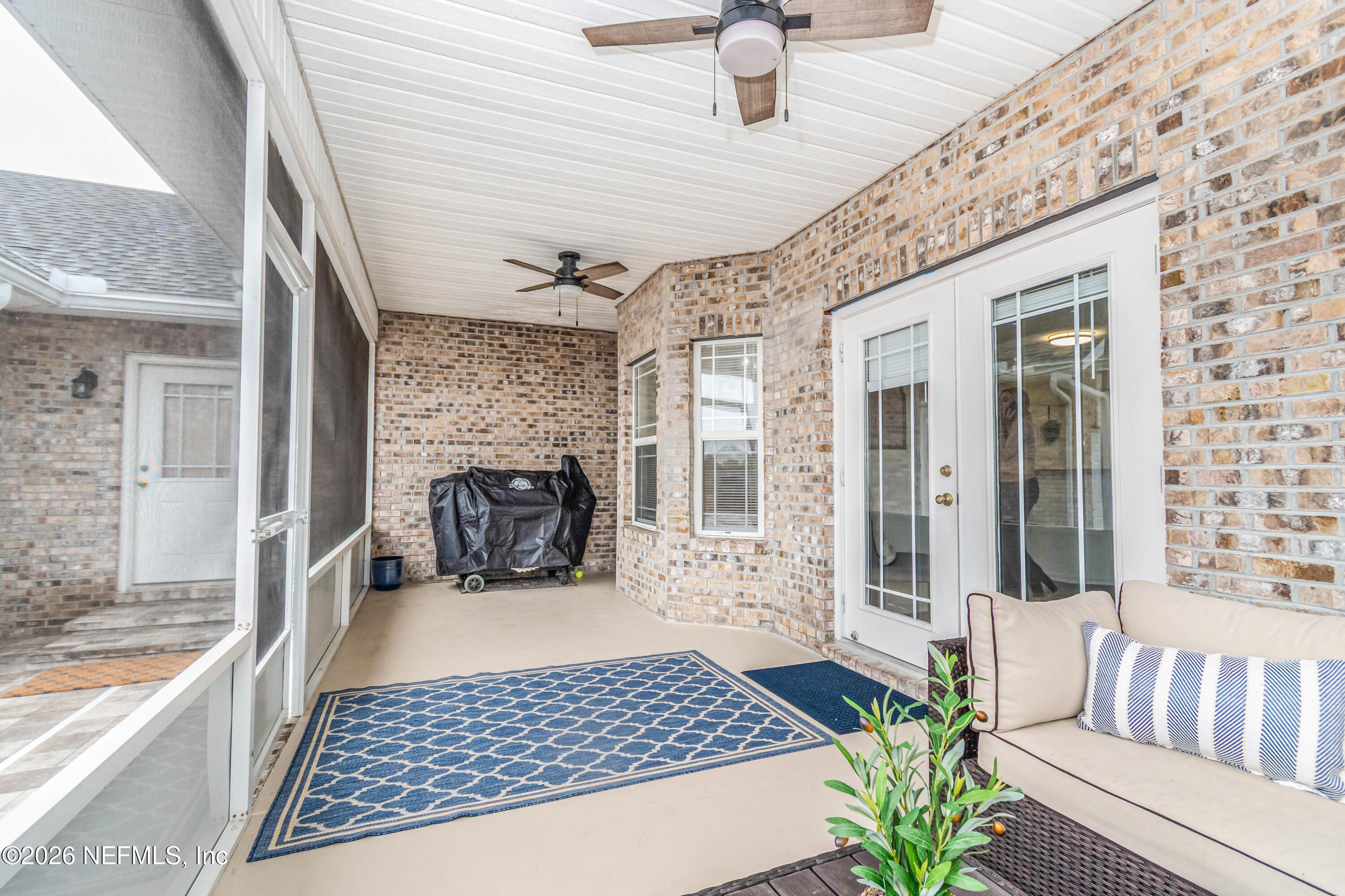 8139 Hunters Ridge South Glen St. Mary, FL 32040 - Photo 37 of 49 a living room with furniture and a fireplace