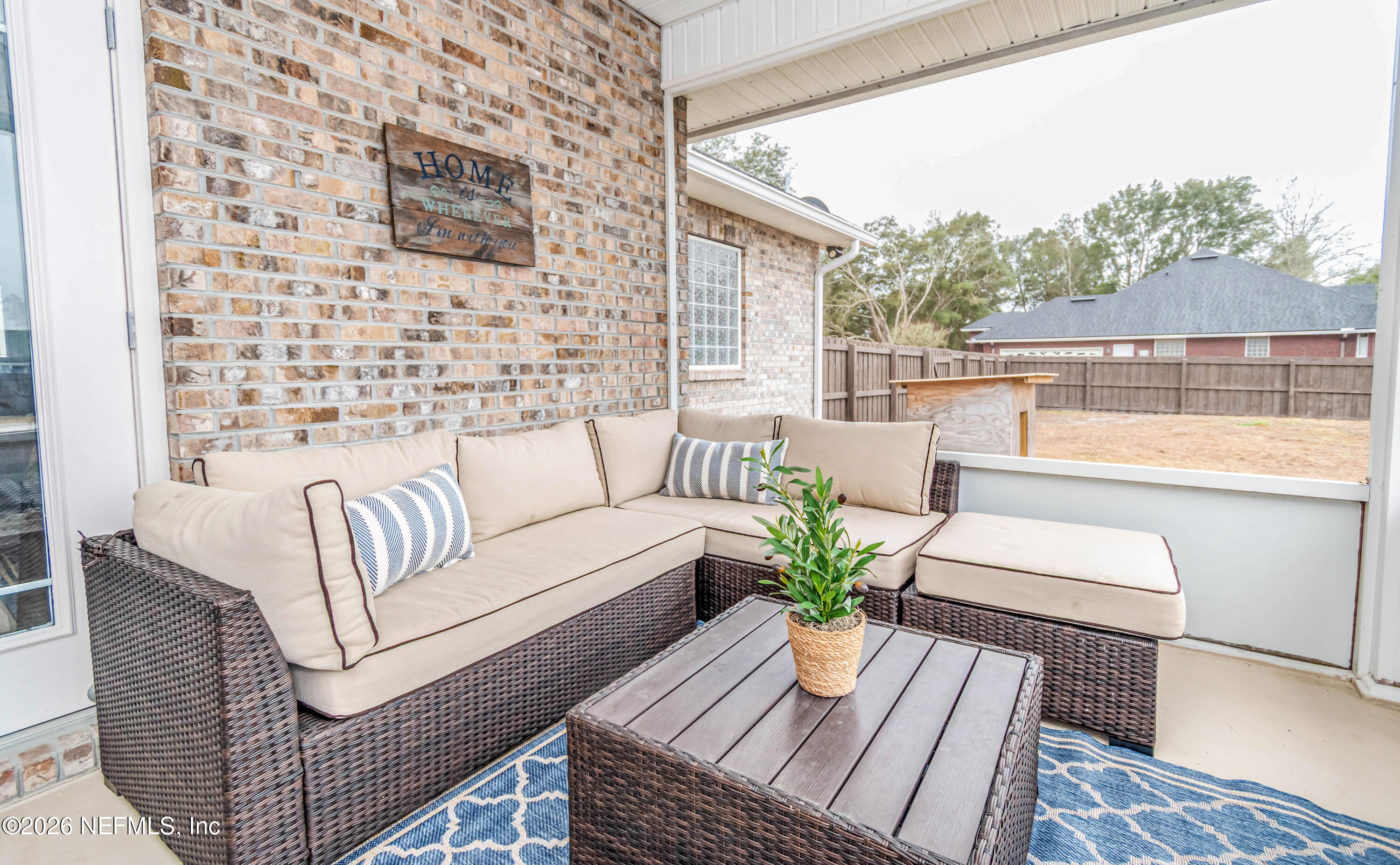 8139 Hunters Ridge South Glen St. Mary, FL 32040 - Photo 38 of 49 a view of a patio on the roof deck
