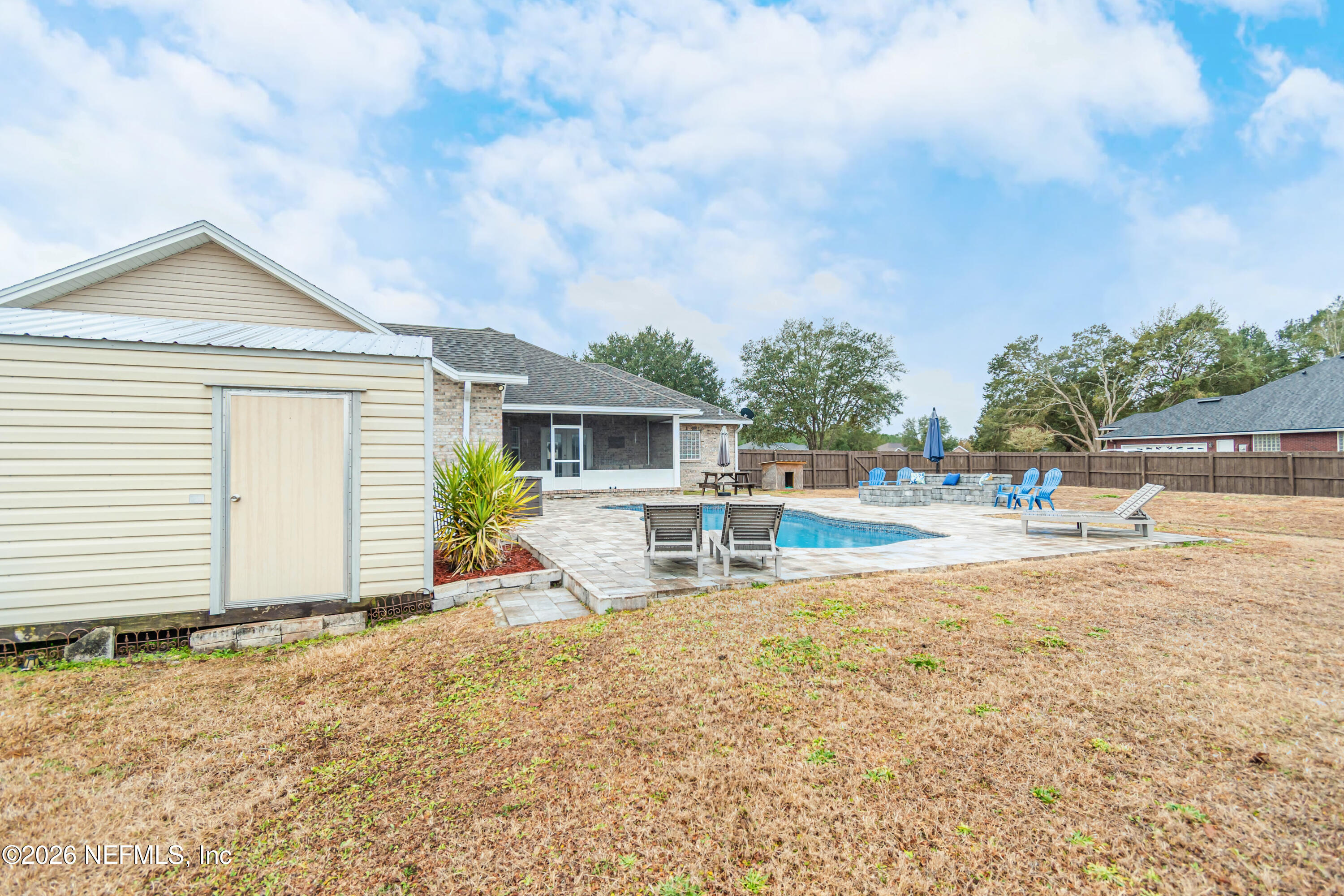8139 Hunters Ridge South Glen St. Mary, FL 32040 - Photo 43 of 49 a house view with a backyard space