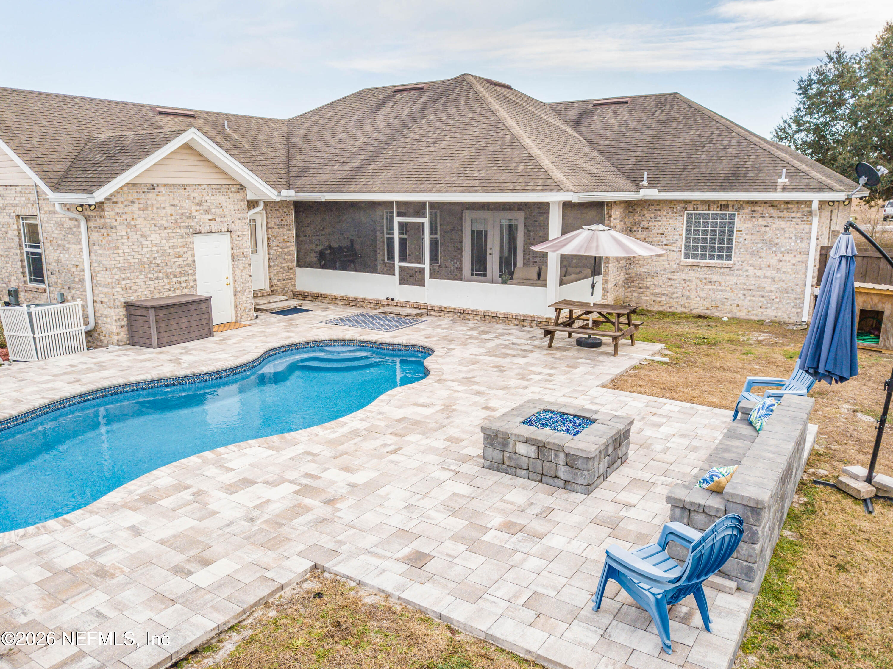 8139 Hunters Ridge South Glen St. Mary, FL 32040 - Photo 47 of 49 a view of a house with swimming pool and sitting area