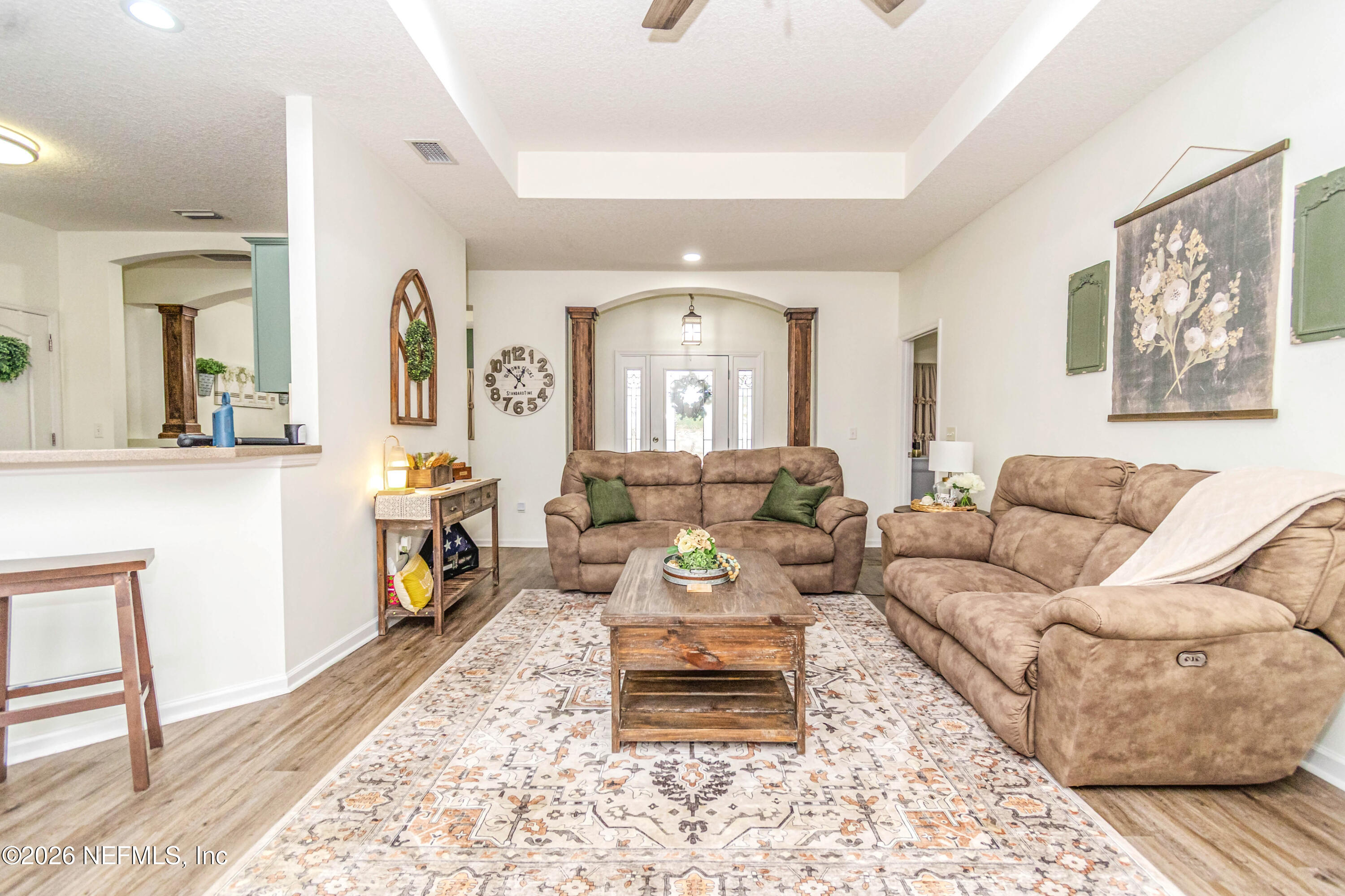 8139 Hunters Ridge South Glen St. Mary, FL 32040 - Photo 7 of 49 a living room with furniture and wooden floor