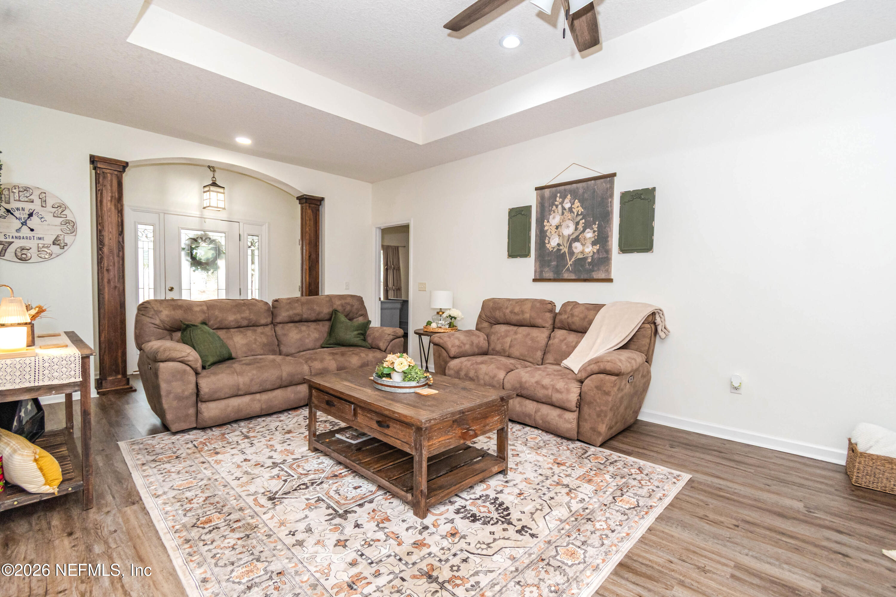 8139 Hunters Ridge South Glen St. Mary, FL 32040 - Photo 9 of 49 a living room with furniture and wooden floor