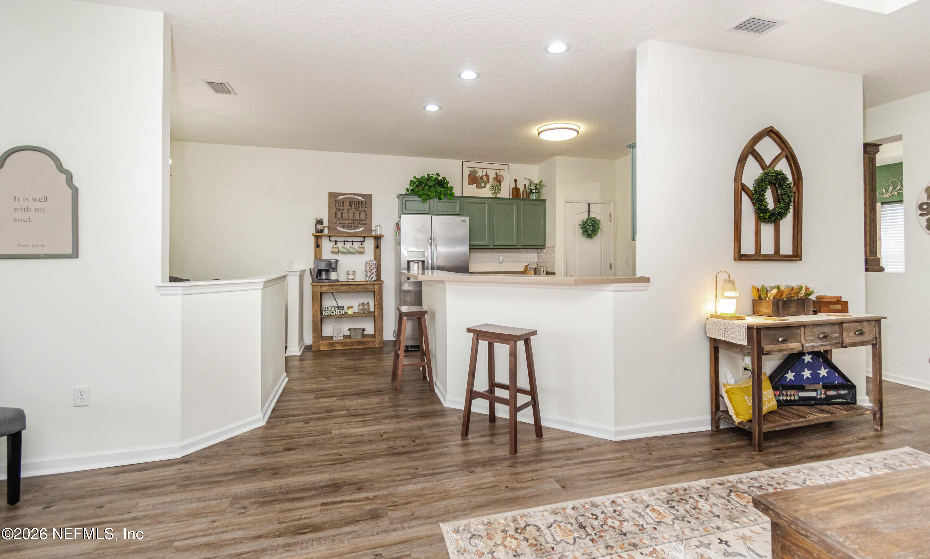 8139 Hunters Ridge South Glen St. Mary, FL 32040 - Photo 10 of 49 a view of a kitchen and dining room