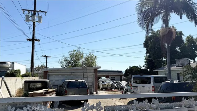 a view of a chairs and table in the balcony