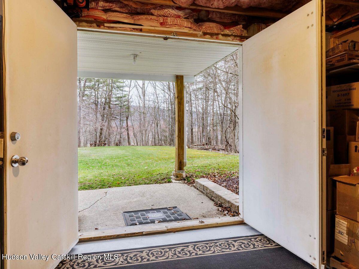 831 North Chodikee Lake Road Highland, NY 12528 - Photo 21 of 31 a view of a room with a porch