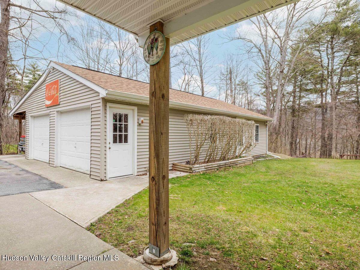 831 North Chodikee Lake Road Highland, NY 12528 - Photo 26 of 31 a backyard of a house with lots of green space