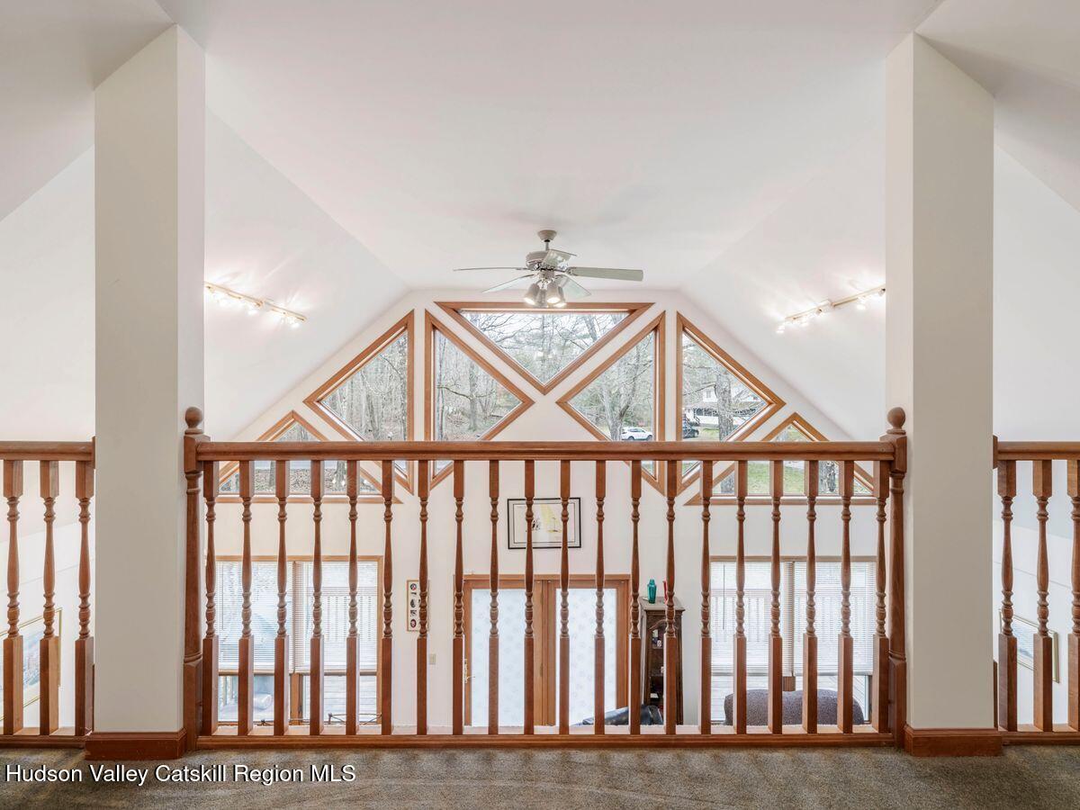 831 North Chodikee Lake Road Highland, NY 12528 - Photo 10 of 31 a view of staircase with lots of white walls