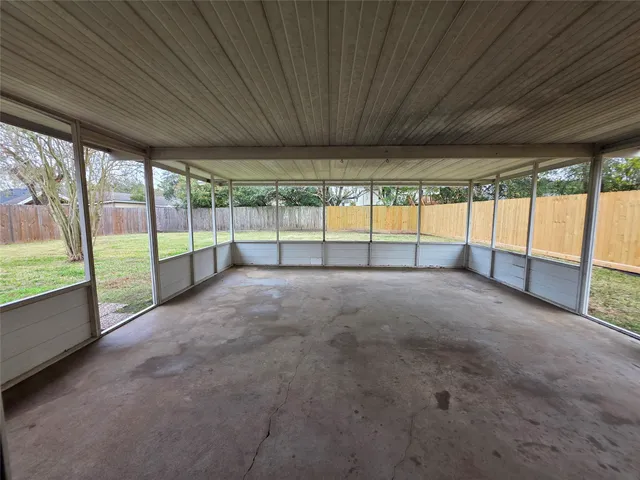 a view of an empty room with window