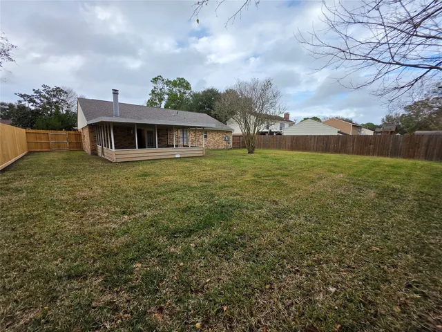 a view of a yard in front of a house