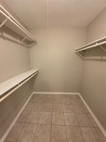 a view of a room with racks on the wall