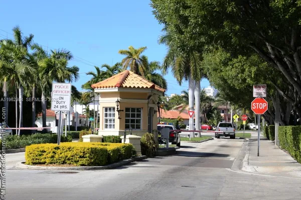 front view of a building with a fountain