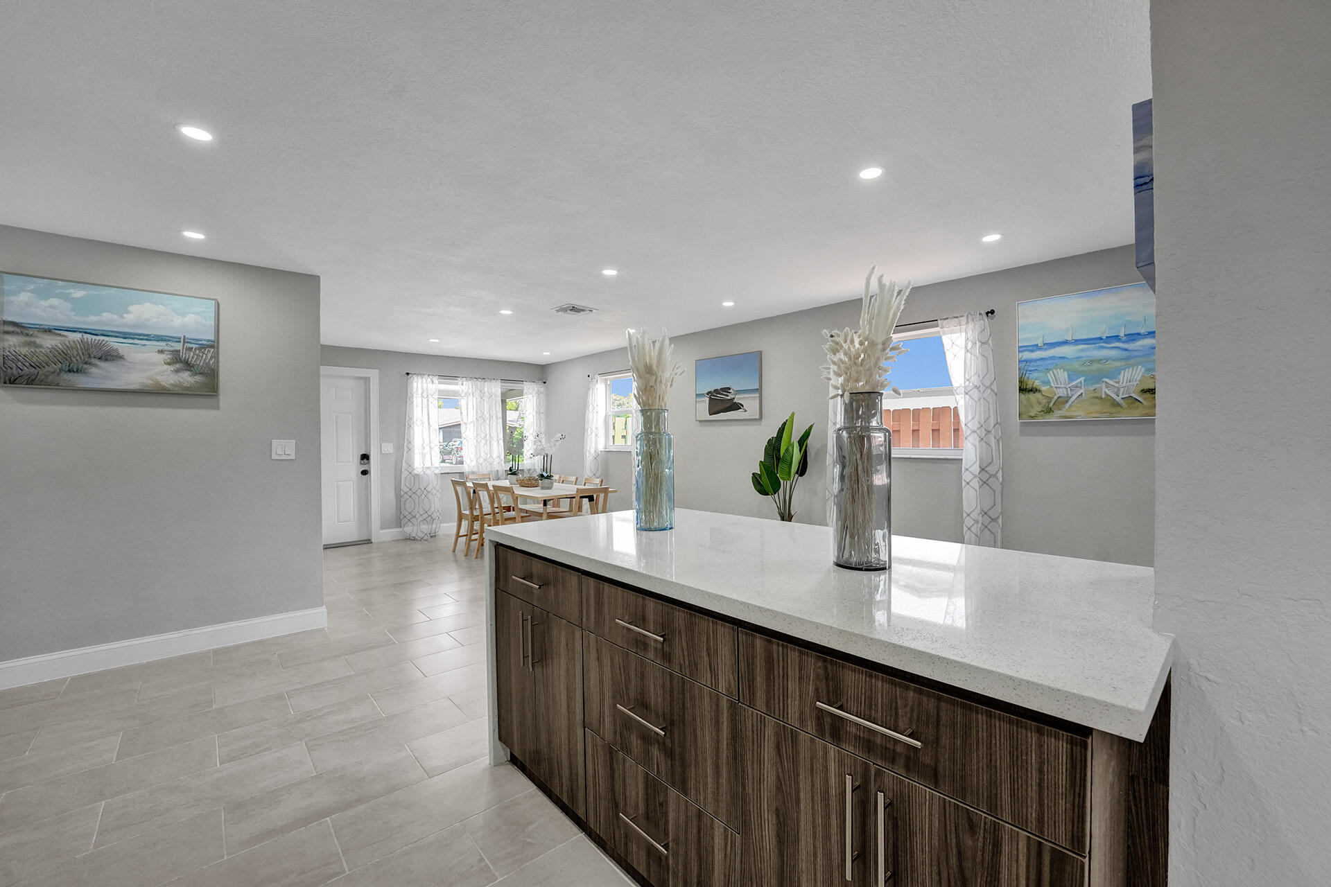 337 Southwest 8th Avenue Delray Beach, FL 33444 - Photo 12 of 48 a large kitchen with kitchen island a sink stainless steel appliances and cabinets