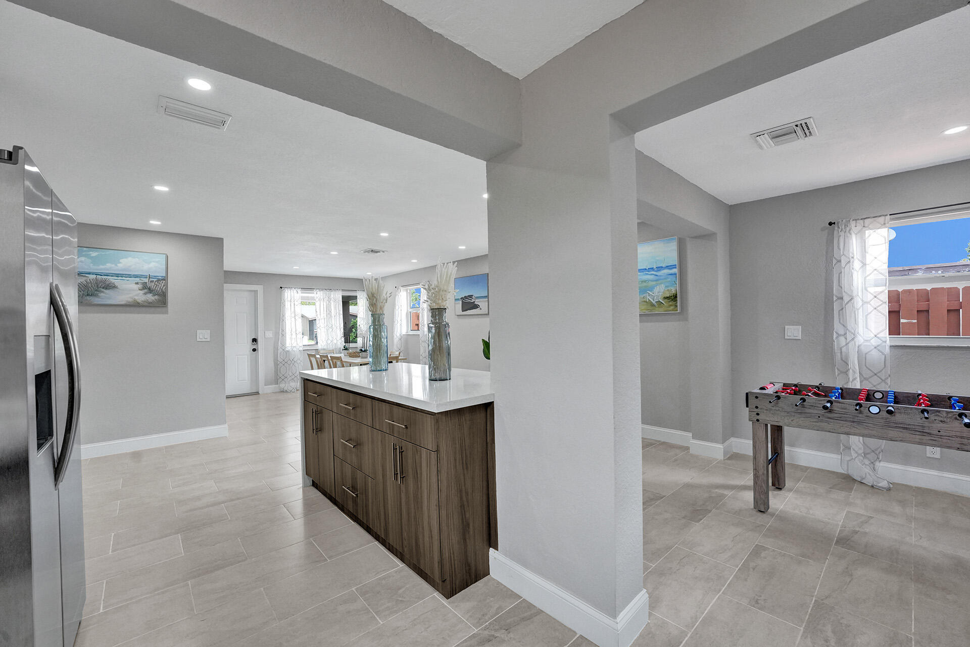 337 Southwest 8th Avenue Delray Beach, FL 33444 - Photo 13 of 48 a view of kitchen and kitchen island