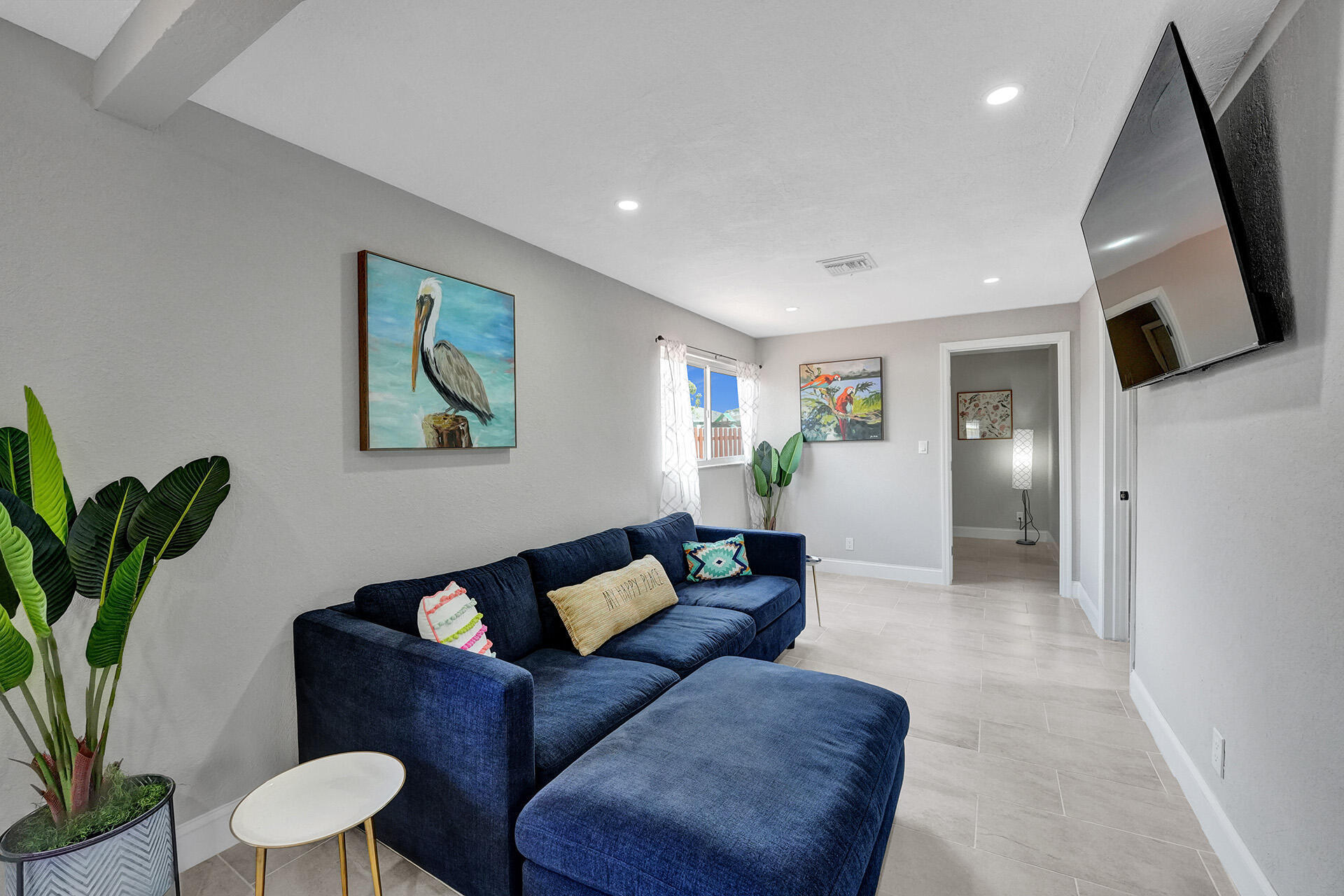337 Southwest 8th Avenue Delray Beach, FL 33444 - Photo 14 of 48 a living room with furniture and a painting on the wall