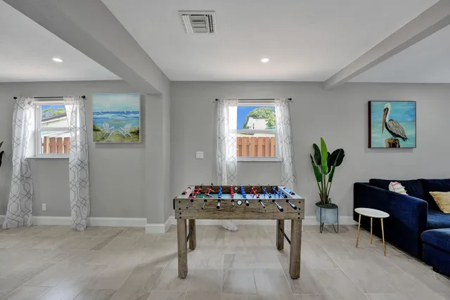 a view of a livingroom with furniture and window