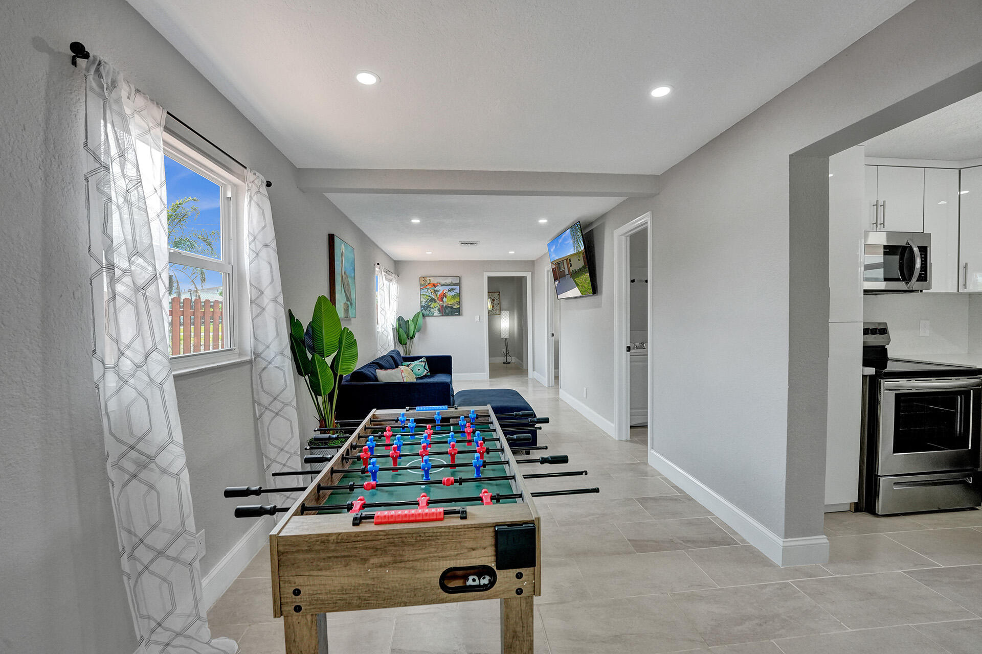 337 Southwest 8th Avenue Delray Beach, FL 33444 - Photo 19 of 48 a room with furniture and a fireplace