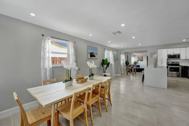 a view of a dining room with furniture