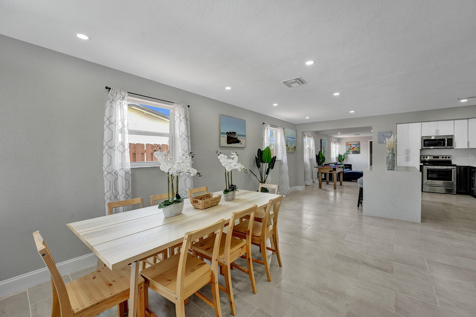 337 Southwest 8th Avenue Delray Beach, FL 33444 - Photo 2 of 48 a view of a dining room with furniture