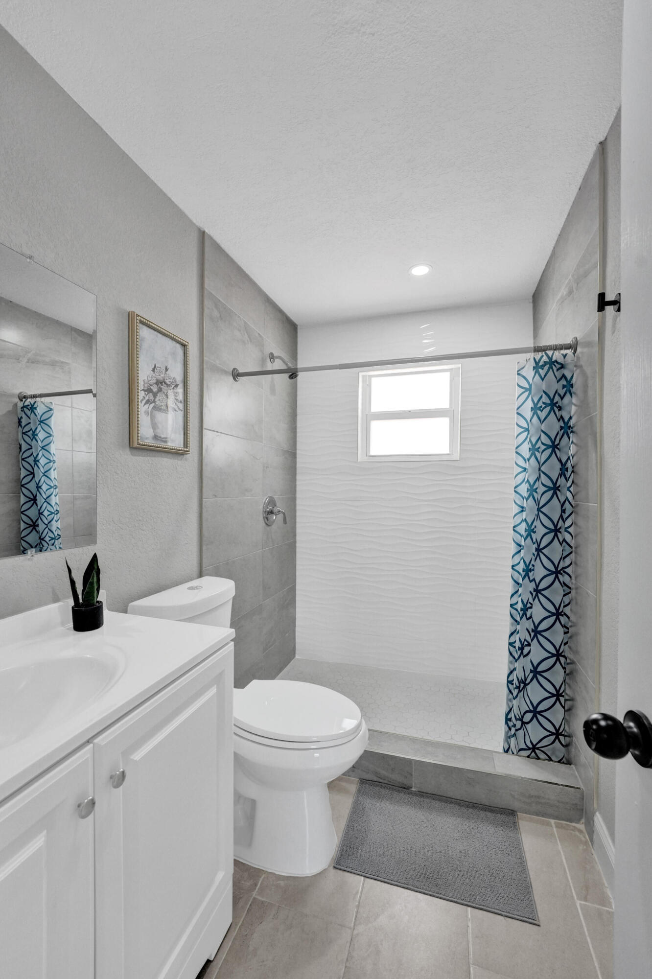 337 Southwest 8th Avenue Delray Beach, FL 33444 - Photo 27 of 48 a bathroom with a sink a toilet and shower