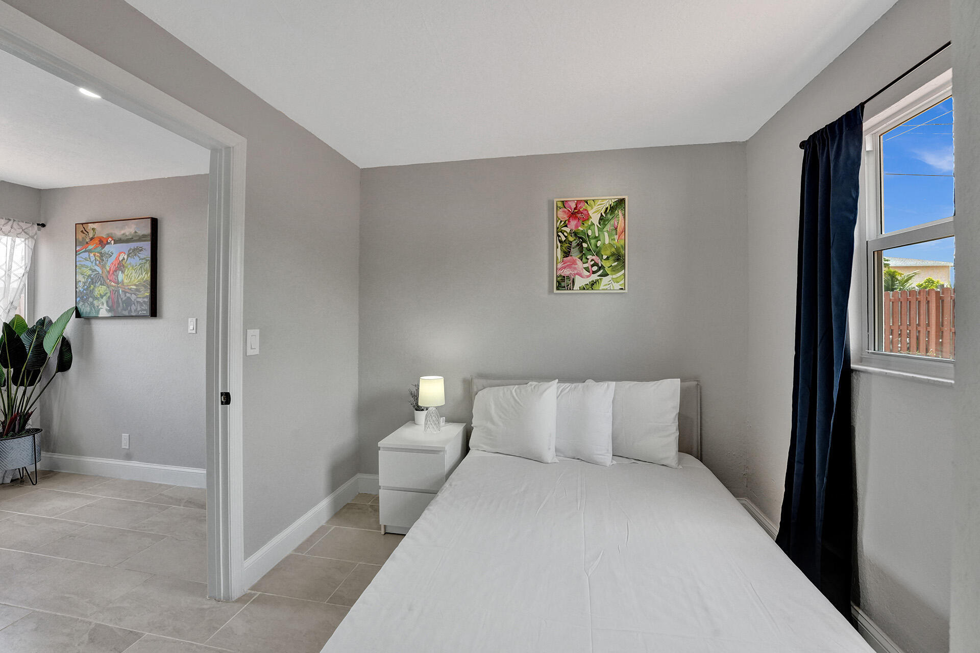 337 Southwest 8th Avenue Delray Beach, FL 33444 - Photo 29 of 48 a bedroom with a bed and a painting on the wall