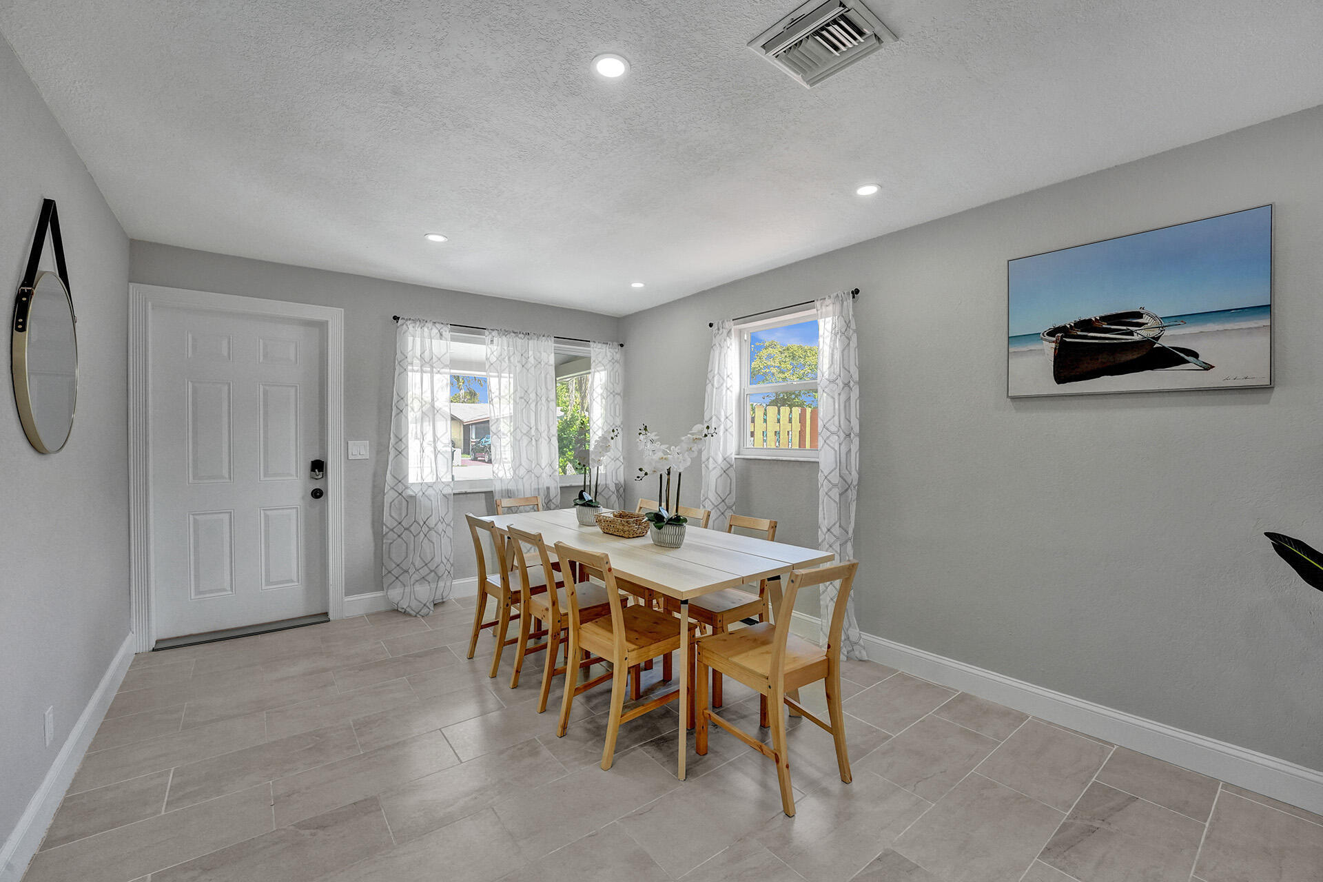 337 Southwest 8th Avenue Delray Beach, FL 33444 - Photo 4 of 48 a view of a dining room with furniture and window
